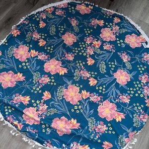 Adore Me round beach towel with tassels. 60” in diameter.